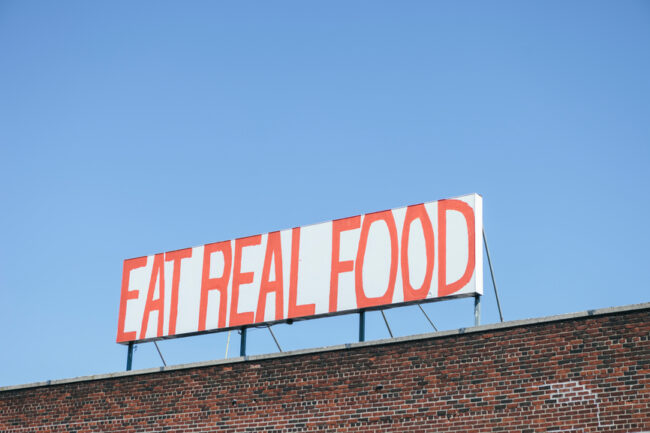 Outdoor Signage that says "Eat Real Food"